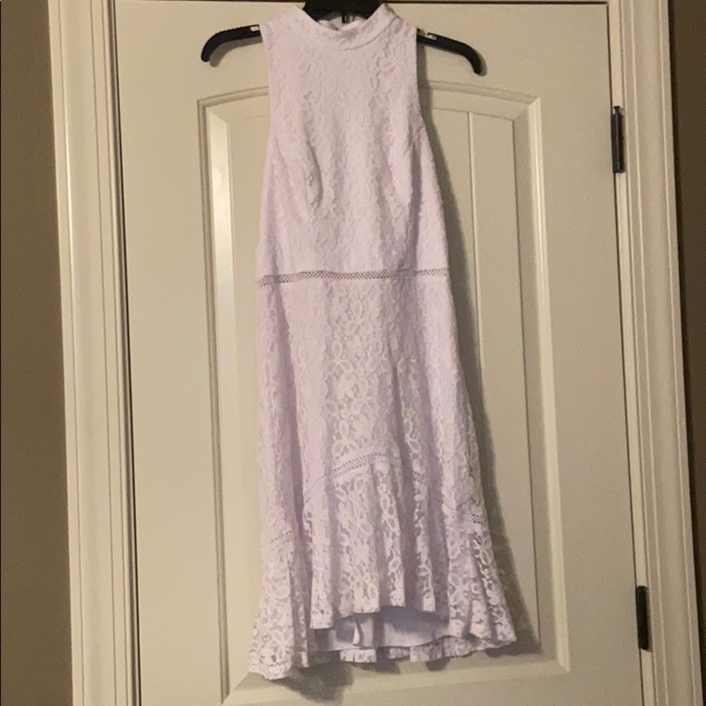 Lace white dress with open back.